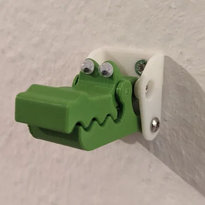 Móc kẹp túi kiểu croco tự nhả (Self releasing croco bag clamp hook)