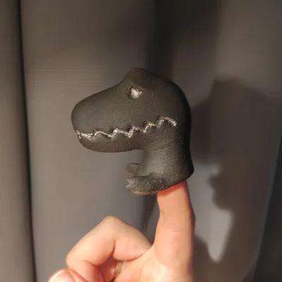 Đồ chơi ngón tay Clap T-rex