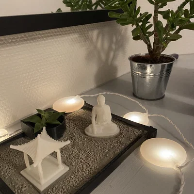 Vườn Zen Có Hoa Và Tượng (Zen Garden with Flower and Statue)