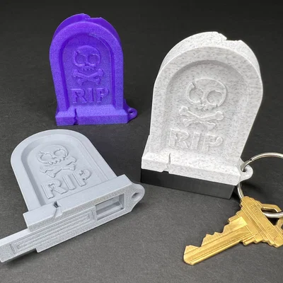 Móc khóa bia mộ RIP có khoang bí mật (nắp trượt)