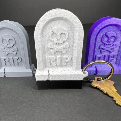 Móc khóa bia mộ RIP có khoang bí mật (nắp trượt)