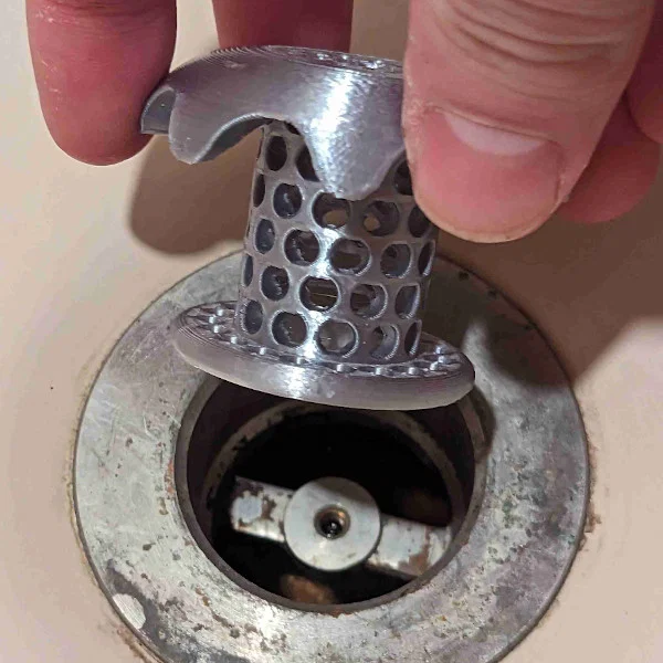 Bộ chặn tóc lỗ thoát nước bồn tắm (Bathtub drain hair catcher) - Image 4