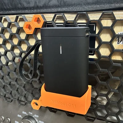 Giá treo máy in nhãn Niimbot D11 cho bảng Honeycomb Storage Wall