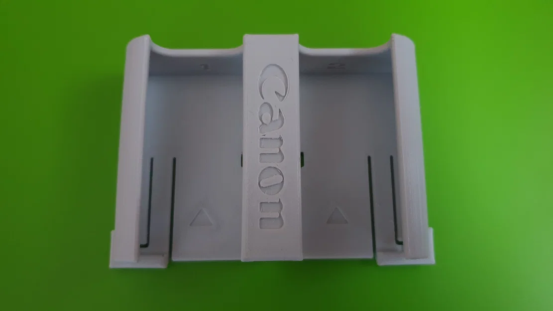 Nhiều khay pin Canon LP-E6 có nút nhả (Several LP-E6 battery packs) - Image 8