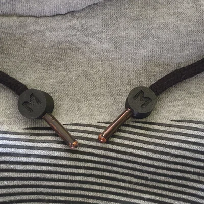 Tope para cordón (Cord Stops) – Chặn dây rút chống tuột