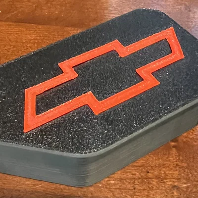 Nắp đậy lỗ cọc thùng xe Chevrolet với Logo Inlay cá tính