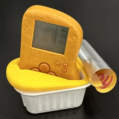 Đế dựng cốc sốt McTetris cho máy McNugget Tetris handheld