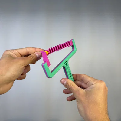 Ná thun bắn nhựa thừa (Filament Poop Slingshot)