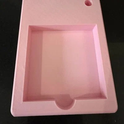 Giá đựng giấy ghi chú (sticky note) và bút