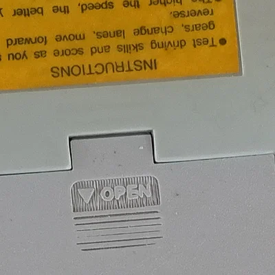 Nắp đậy pin cho máy chơi game cầm tay Bandai Champion Racer
