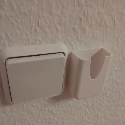 Giá treo remote gắn tường cho công tắc đèn Lindby