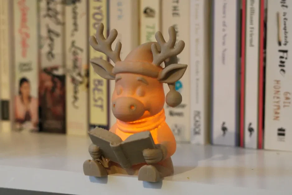 Tuần lộc Rudolph đọc sách – Tealight <30g - Image 2