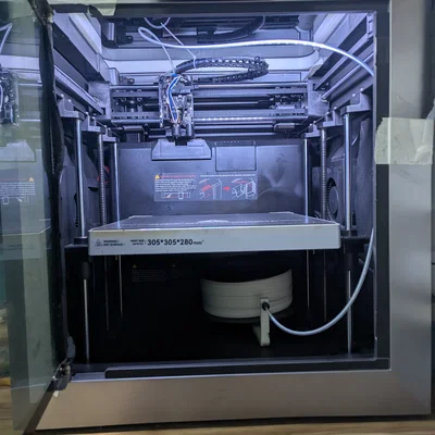 Giá đỡ cuộn filament đặt ngang (trong buồng in)