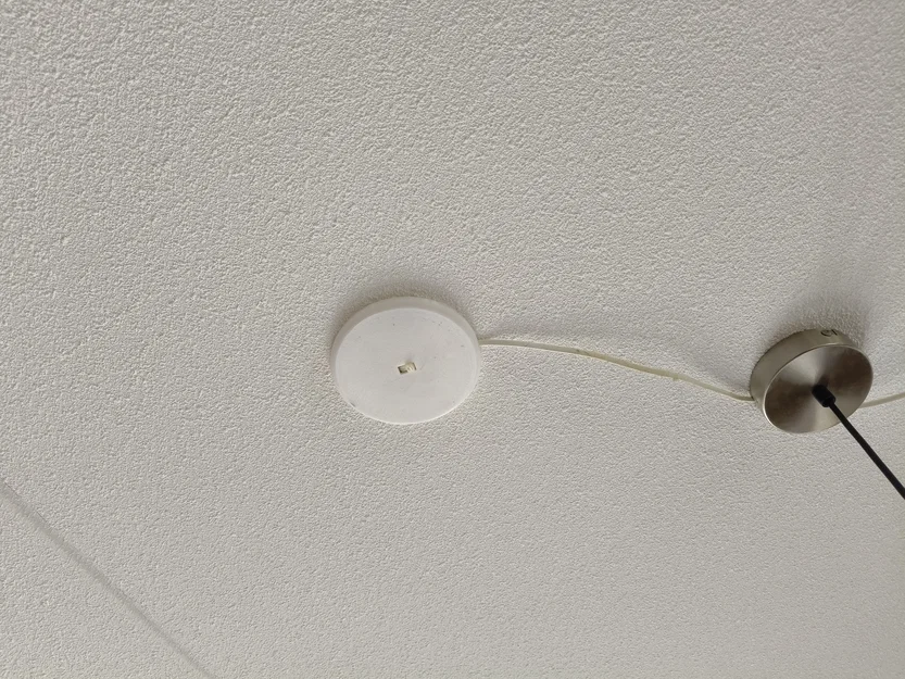 Nắp che ổ điện trần có lỗ dẫn dây (Ceiling outlet cover with wire outlet) - Image 1