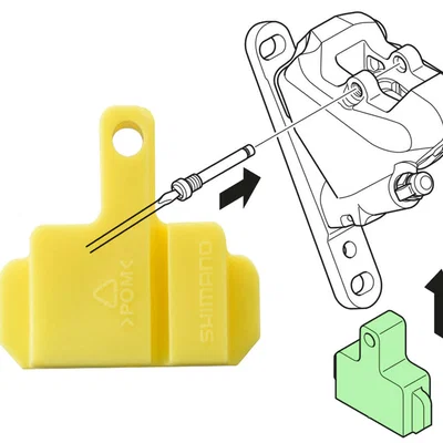 Spacer bleed block cho heo phanh Shimano bị “lazy piston”