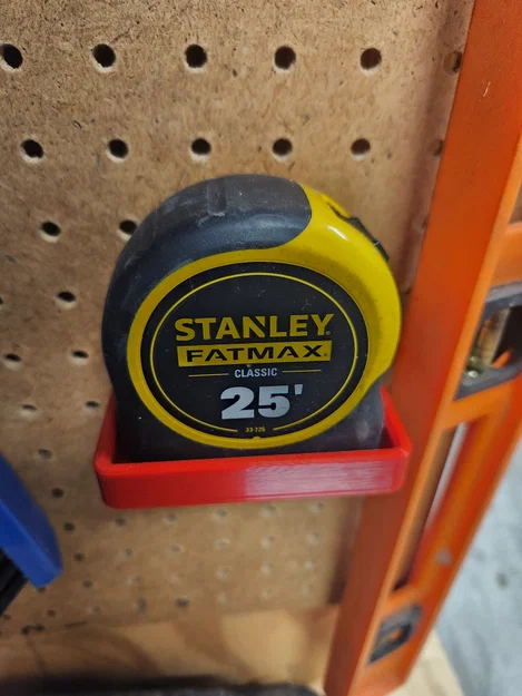 Giá treo thước cuộn Stanley Fatmax cho bảng lỗ Pegboard - Image 1