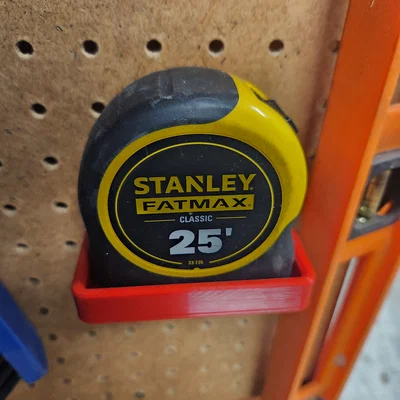 Giá treo thước cuộn Stanley Fatmax cho bảng lỗ Pegboard