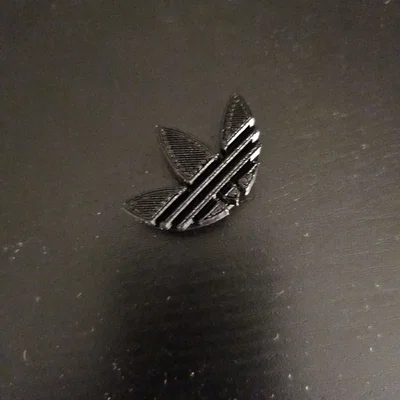 Phụ kiện Jibbitz Adidas trang trí dép Crocs in 3D độc đáo