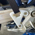 Pat bảo vệ gót chân kiêm móc treo túi cho Husqvarna 701 (3D Print) - Thumbnail 1