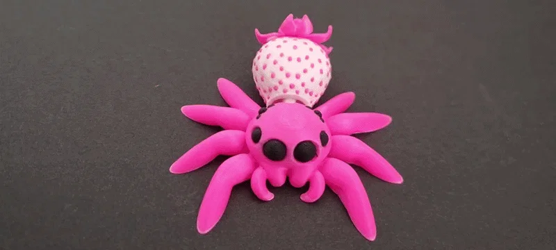 Nhện nhảy dâu tây – articulated flexi toy - Image 1