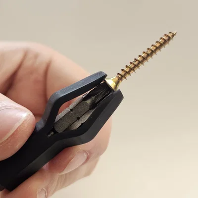 Đồ Giữ Vít Tự Nhả (Auto‑Releasing Screw Holder)