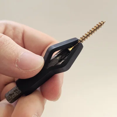Đồ Giữ Vít Tự Nhả (Auto‑Releasing Screw Holder)