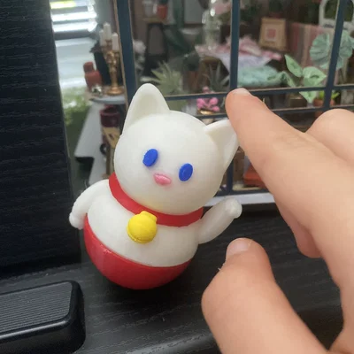 Chú Mèo Thần Tài Lắc Lư (Weeble)!