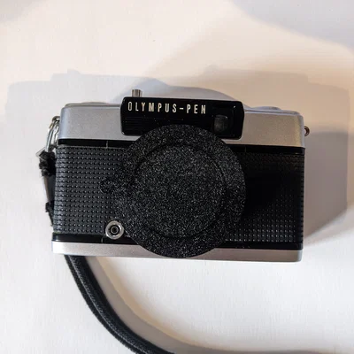Nắp đậy ống kính 3D cho máy ảnh Olympus Pen EE2