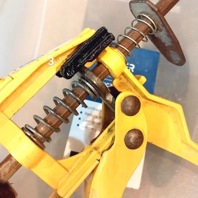 Bộ Fixer Giữ Đuôi Release Plate Cho Caulk Gun