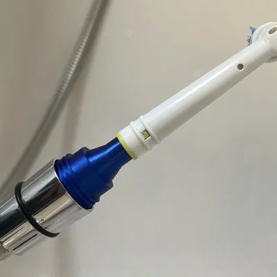 Adapter vệ sinh sâu đầu bàn chải Oral-B (gắn vào dây vòi sen)