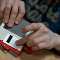 Dụng cụ vệ sinh đĩa mềm 3.5 inch bất biến theo mặt (Side-invariant) - Thumbnail 2