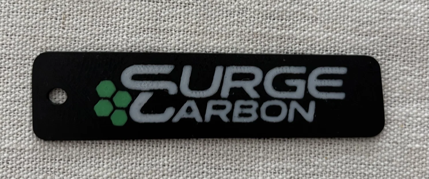 Móc khóa in 3D Surge Carbon phong cách cho xe đạp điện - Image 1