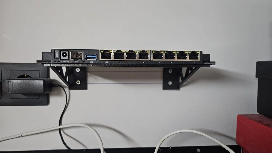 Giá treo tường cho router Mikrotik RB5009 chuyên dụng - Image 1