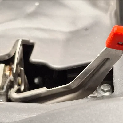 Ốp chụp đầu chốt khóa nắp capo (Hood Latch Tip Cover)