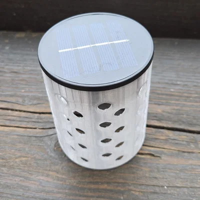 Đèn bàn LED năng lượng mặt trời đơn giản với các điểm sáng tròn
