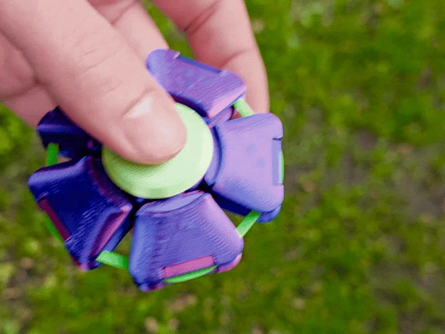 Spin'n'Squeeze Fidget Toy – Đồ chơi bóp & quay (Spinner) chống kẹt - Image 2