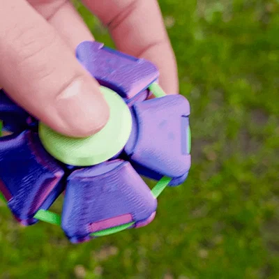 Spin'n'Squeeze Fidget Toy – Đồ chơi bóp & quay (Spinner) chống kẹt
