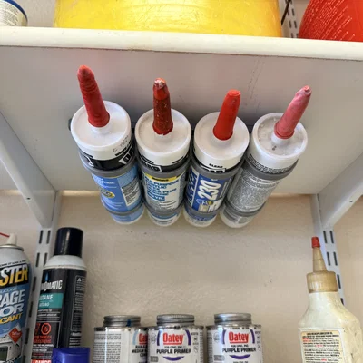 Bản remix giá treo ống keo trét gầm kệ (Under_shelf Caulk Tube Holder Remix)