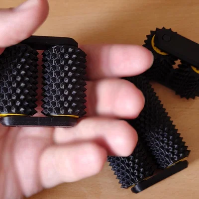 Con lăn tay gai (spiky hand roller) với printed bearings