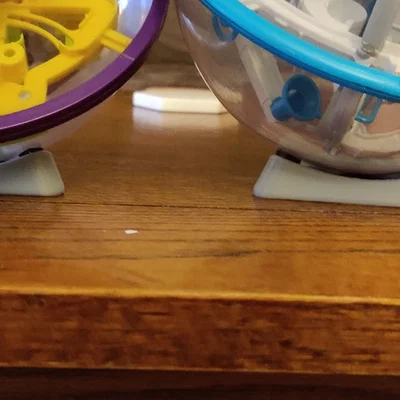 Đế giữ cho quả cầu Perplexus