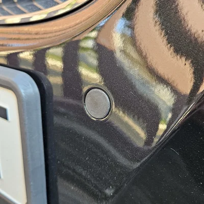 Nắp che cảm biến Parktronic cản trước cho BMW