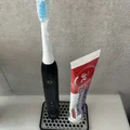 Giá đỡ bàn chải Oral-B Pulsonic 2000 kèm khay kem đánh răng thông minh - Thumbnail 1