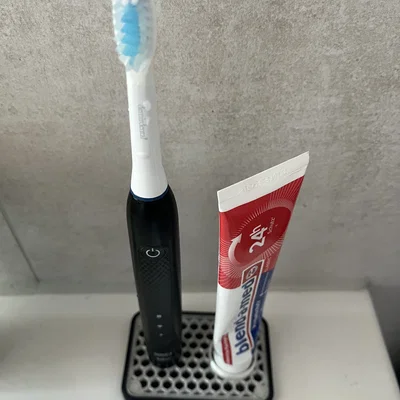 Giá đỡ bàn chải Oral-B Pulsonic 2000 kèm khay kem đánh răng thông minh