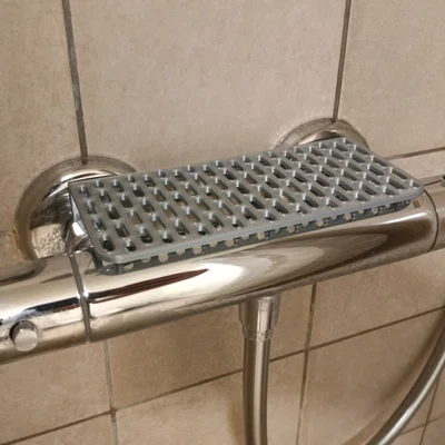 Kệ để đồ trên vòi sen nóng lạnh