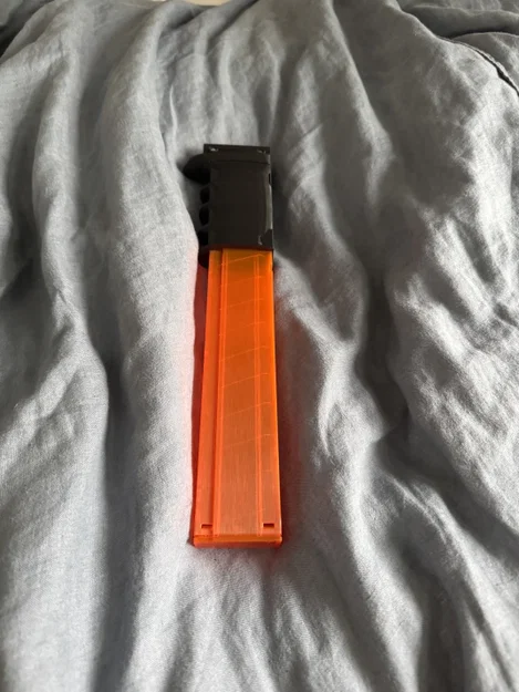 Tay cầm Nerf tích hợp khe giữ băng đạn Talon in 3D tiện lợi - Image 1