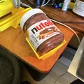 Giá đỡ Nutella Cradle - Giúp lấy hết sạch sốt sô-cô-la dễ dàng - Thumbnail 1