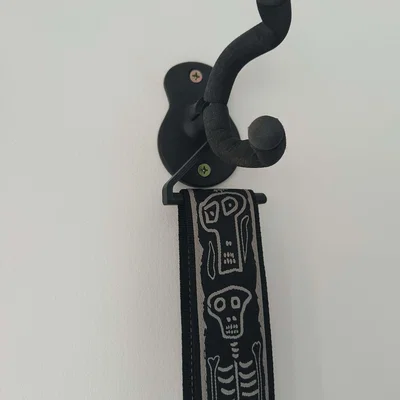 Móc treo dây đeo đàn Guitar