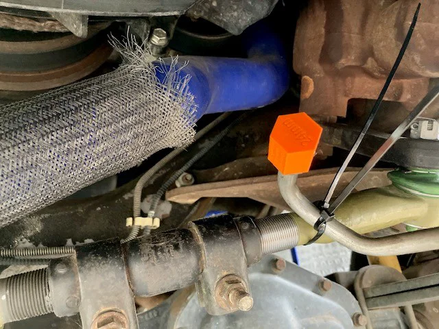Nắp bịt đường ống làm mát hộp số Ford Super Duty (vị trí két nước) - Image 5