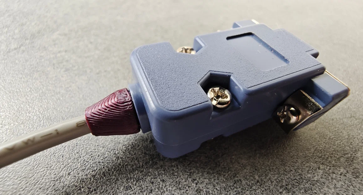 Bộ kẹp giữ cáp DB9/DE-9 bền bỉ giúp bảo vệ đầu nối tín hiệu - Image 1
