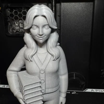 Mô hình cô giáo cầm sách in 3D - Quà tặng ý nghĩa cho thầy cô